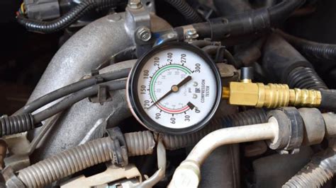 use a tire pressure gauge as a compression test|How to Do a Compression Test .